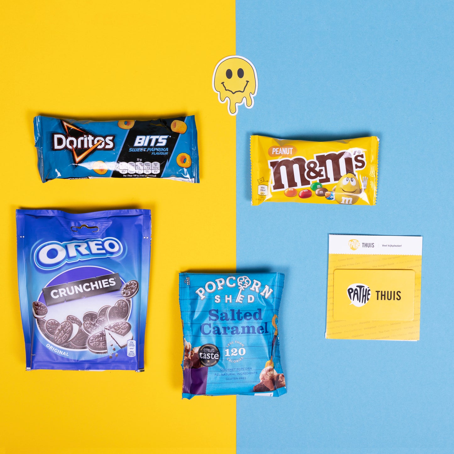 Een MovieBox-geschenk met een Pathé-kaart, heerlijke Popcorn Shed, M&M's en Milka-snacks, klaar voor een avond vol plezier en entertainment